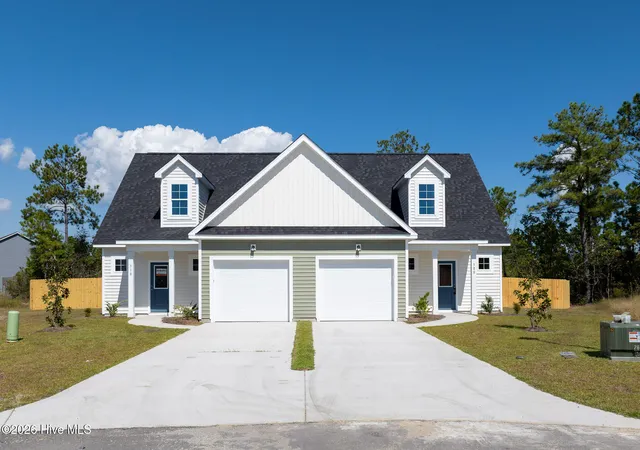 Photo 1 of Townhouse for sale at 305 Coastal Reef Ct, Holly Ridge, NC 28445 | MLS# 100607772 | Listing updated on 2026-10-28