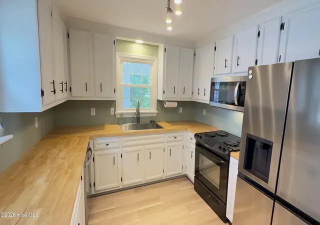 Photo 4 of Single family home for sale at 410 Waters Cir, Goldsboro, NC 27534 | MLS# 100602733 | Listing updated on 2026-09-10