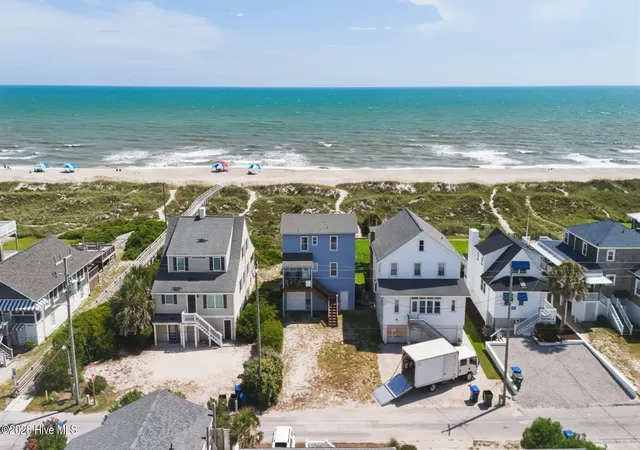 Photo 1 of Single family home for sale at 214 E Boardwalk Blvd, Atlantic Beach, NC 28512 | MLS# 100596429 | Listing updated on 2026-09-09