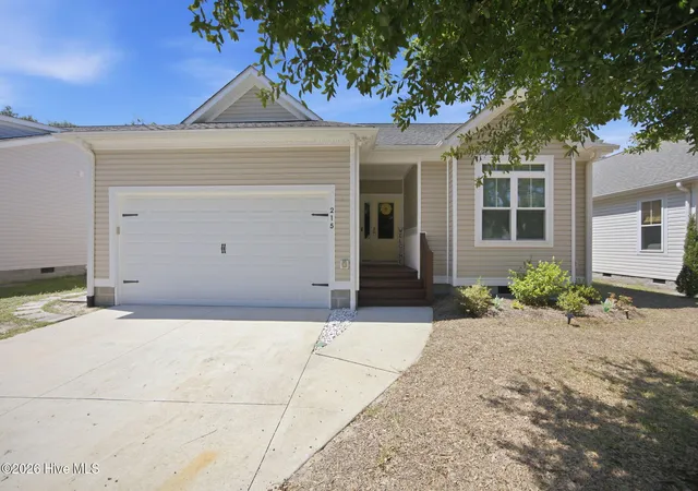Photo 1 of Single family home for sale at 215 Ne 54th Street, Oak Island, NC 28465 | MLS# 100602210 | Listing updated on 2026-09-13