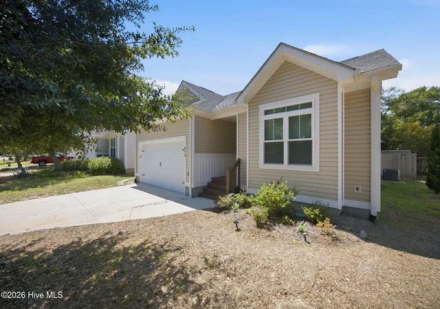 Photo 2 of Single family home for sale at 215 Ne 54th Street, Oak Island, NC 28465 | MLS# 100602210 | Listing updated on 2026-09-13