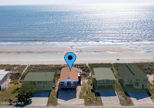 Photo 2 of Single family home for sale at 223 W Beach Dr, Oak Island, NC 28465 | MLS# 100600878 | Listing updated on 2026-09-18