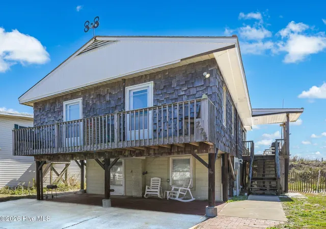 Photo 3 of Single family home for sale at 223 W Beach Dr, Oak Island, NC 28465 | MLS# 100600878 | Listing updated on 2026-09-18