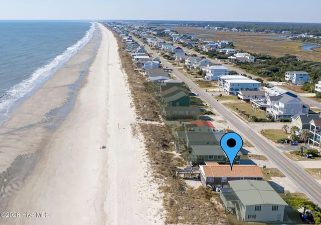 Photo 4 of Single family home for sale at 223 W Beach Dr, Oak Island, NC 28465 | MLS# 100600878 | Listing updated on 2026-09-18