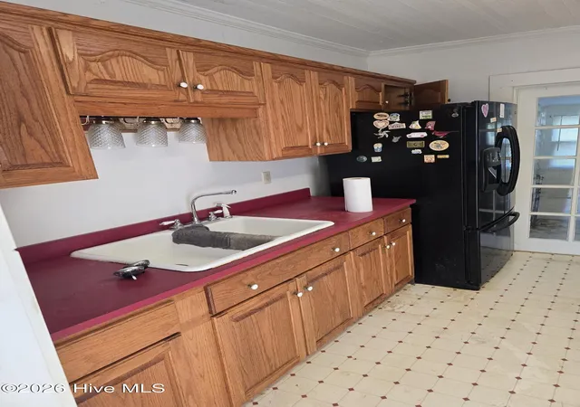 Photo 4 of Single family home for sale at 201 N Southerland St, Mount Olive, NC 28365 | MLS# 100609721 | Listing updated on 2026-10-12