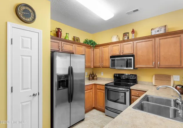Listing Photo 5 - Condo for sale in building located at 4102 Pinehurst Cir, Little River, SC 29566 - Unit #Apt 1i