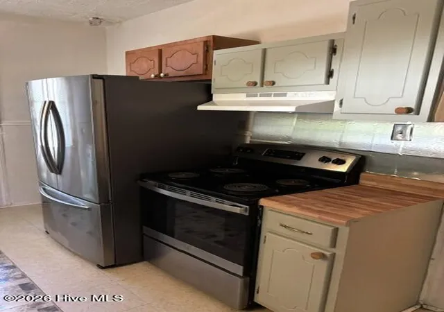 Photo 4 of Single family home for sale at 411 Raleigh Rd Pkwy N, Wilson, NC 27893 | MLS# 100609875 | Listing updated on 2026-10-16