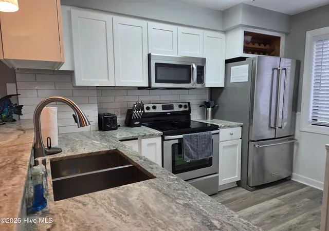 Photo 3 of Condo for sale at 707 Pelican Ct, Kure Beach, NC 28449 | MLS# 100610419 | Listing updated on 2026-10-15