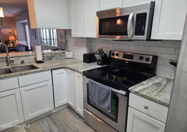 Photo 4 of Condo for sale at 707 Pelican Ct, Kure Beach, NC 28449 | MLS# 100610419 | Listing updated on 2026-10-15