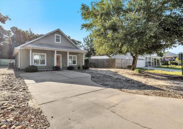 Photo 3 of Single family home for sale at 102 Nw 4th Street, Oak Island, NC 28465 | MLS# 100600160 | Listing updated on 2026-09-29