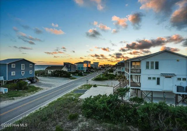 Photo 3 of Single family home for sale at 126 W Beach Dr, Oak Island, NC 28465 | MLS# 100602826 | Listing updated on 2026-09-29