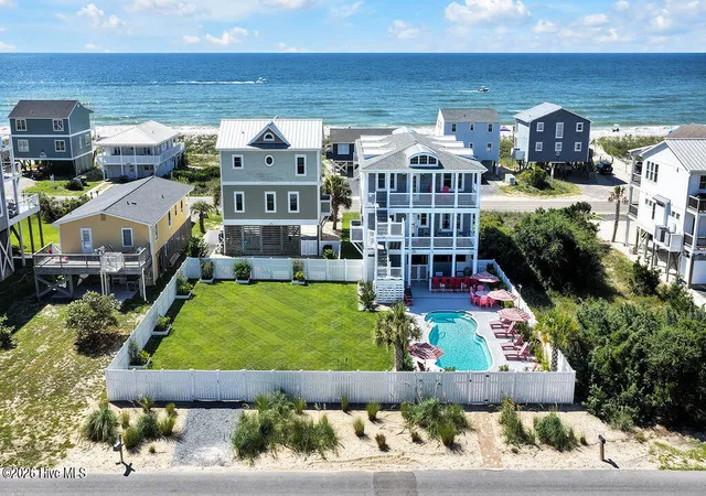 Photo 3 of Single family home for sale at 126 W Beach Dr, Oak Island, NC 28465 | MLS# 100602826 | Listing updated on 2026-09-29