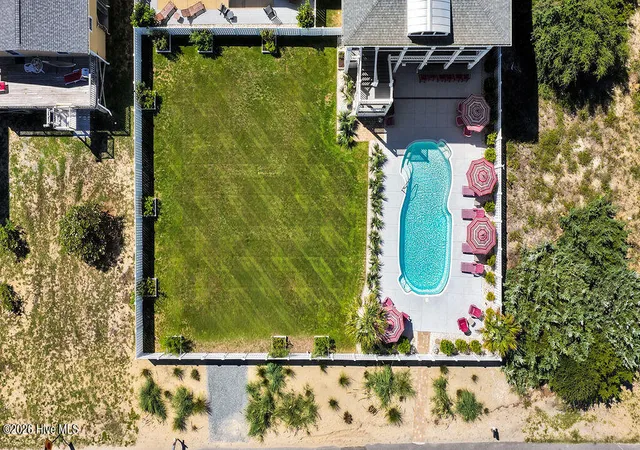 Photo 4 of Single family home for sale at 126 W Beach Dr, Oak Island, NC 28465 | MLS# 100602826 | Listing updated on 2026-09-29
