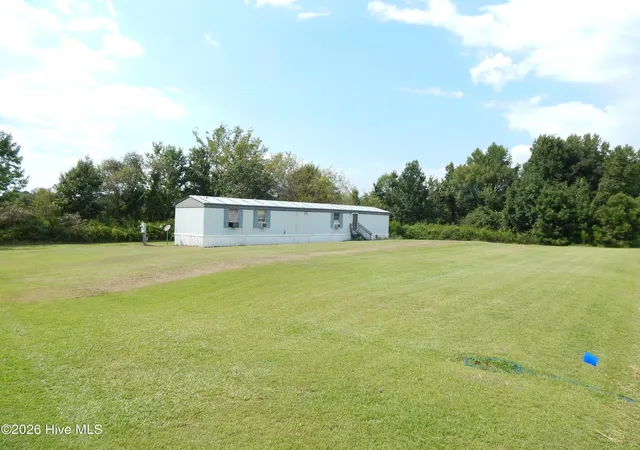 Photo 1 of Land for sale at 909 Gum Swamp Church Rd, Greenville, NC 27834 | MLS# 100600797 | Listing updated on 2026-09-09