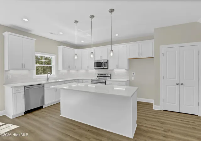 Photo 4 of Single family home for sale at 126 Penquin Pl, Hampstead, NC 28443 | MLS# 100602958 | Listing updated on 2026-09-12