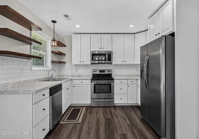 Photo 2 of Single family home for sale at 912 Laurel Ln, Jacksonville, NC 28546 | MLS# 100600990 | Listing updated on 2026-09-03