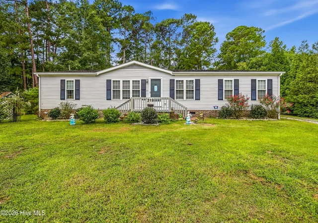 Photo 2 of Manufactured home for sale at 319 Beachwood Dr Nw, Calabash, NC 28467 | MLS# 100603242 | Listing updated on 2026-09-16
