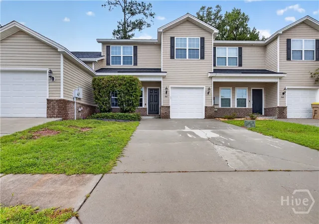 Photo 1 of Townhouse for sale at 212 Cypress Pointe Dr, Richmond Hill, GA 31324 | MLS# SA364264 | Listing updated on 2026-09-14