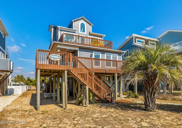 Photo 1 of Single family home for sale at 318 E Beach Dr, Oak Island, NC 28465 | MLS# 100602742 | Listing updated on 2026-10-05
