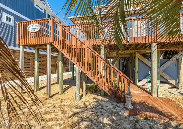 Photo 4 of Single family home for sale at 318 E Beach Dr, Oak Island, NC 28465 | MLS# 100602742 | Listing updated on 2026-10-05