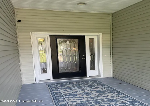 Photo 3 of Single family home for sale at 303 Oakmont Dr, Hampstead, NC 28443 | MLS# 100601873 | Listing updated on 2026-09-07