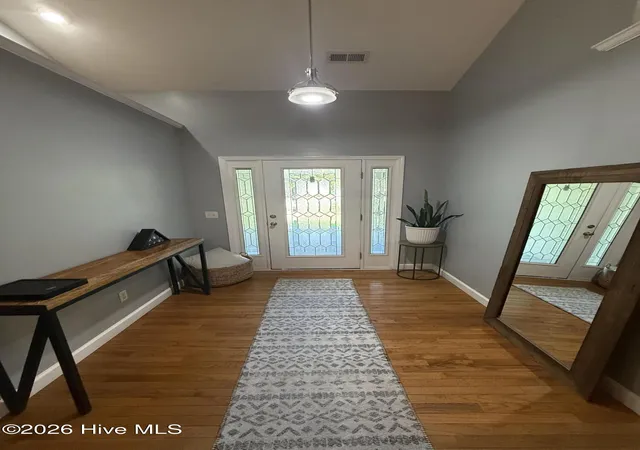 Photo 3 of Single family home for sale at 303 Oakmont Dr, Hampstead, NC 28443 | MLS# 100601873 | Listing updated on 2026-09-07