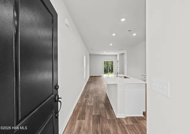 Photo 2 of Single family home for sale at 1033 Harbor Dr, Calabash, NC 28467 | MLS# 100601096 | Listing updated on 2026-09-13