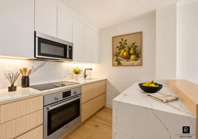 Listing Photo 2 - Condo for sale in building located at 100 Scholes St, New York City, NY 11206 - Unit #1-A