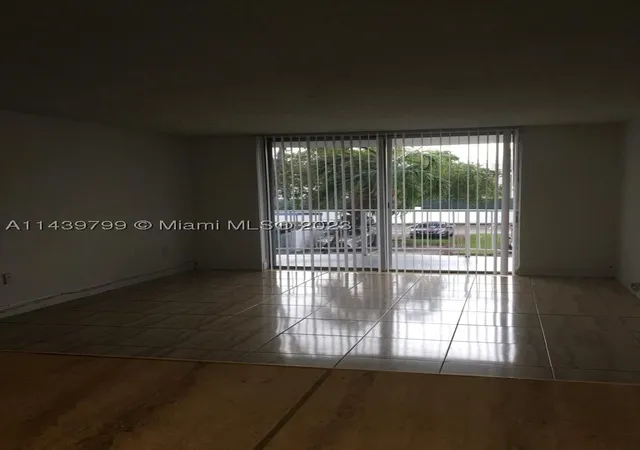 Listing Photo 1 - Condo for sale in building located at 498 Nw 165Th St Rd, Miami, FL 33169 - Unit #D205