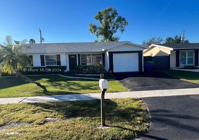 Photo 2 of Single family home for sale at 11520 Nw 31st Pl, Sunrise, FL 33323 | MLS# A11531971 | Listing updated on 2026-09-02