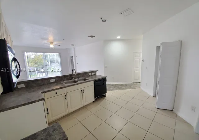 Photo 2 of Condo for sale at 1945 Marsh Harbor Dr #1945, West Palm Beach, FL 33404 | MLS# A11593595 | Listing updated on 2026-09-04