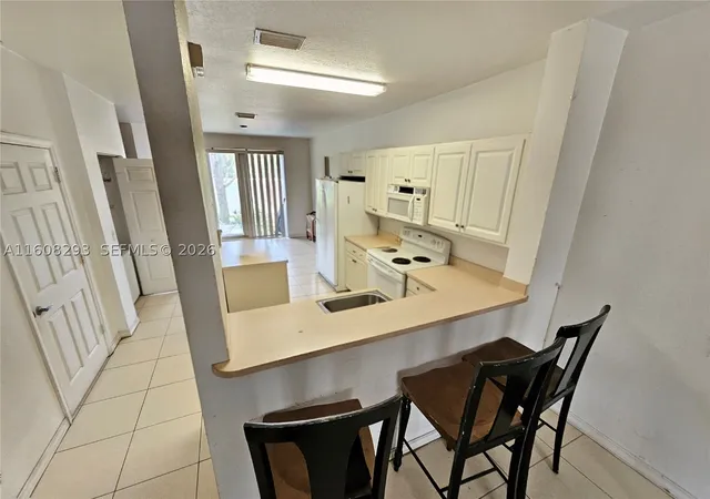 Photo 3 of Townhouse for sale at 3556 Oleander Ter #3556, Riviera Beach, FL 33404 | MLS# A11608293 | Listing updated on 2026-10-06
