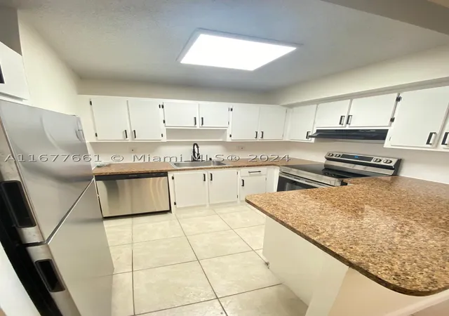 Listing Photo 2 - Condo for sale in building located at 2029 Nw 46Th Ave, Lauderhill, FL 33313 - Unit #E308