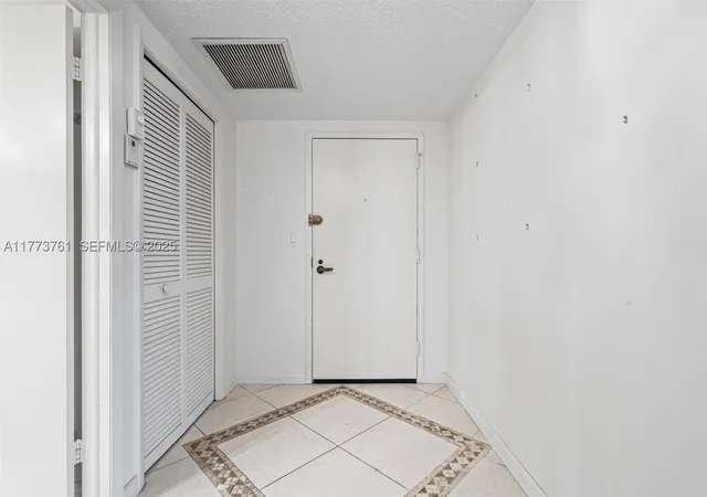 Listing Photo 2 - Condo for sale in building located at 7200 Radice Ct, Lauderhill, FL 33319 - Unit #709