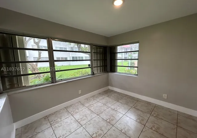 Listing Photo 5 - Condo for sale in building located at 1450 Ne 191St St, Miami, FL 33179 - Unit #106