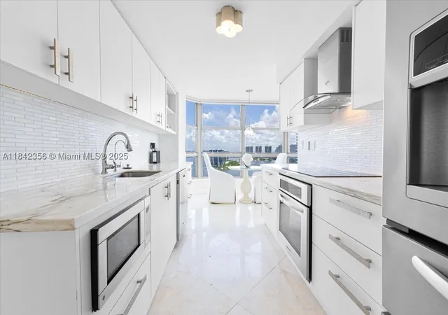 Photo 1 of Condo for sale at 3500 Mystic Pointe Dr #2101, Aventura, FL 33180 | MLS# A11842356 | Listing updated on 2026-09-23