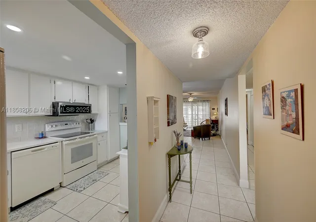Condo for sale at 3186 Via Poinciana #203, Lake Worth, FL 33467 | MLS# A11858206 | Listing updated on 2026-09-03
