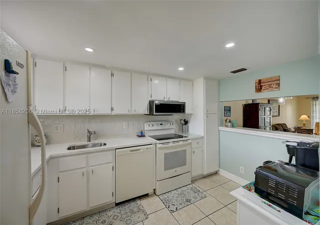 Photo 2 of Condo for sale at 3186 Via Poinciana #203, Lake Worth, FL 33467 | MLS# A11858206 | Listing updated on 2026-09-03