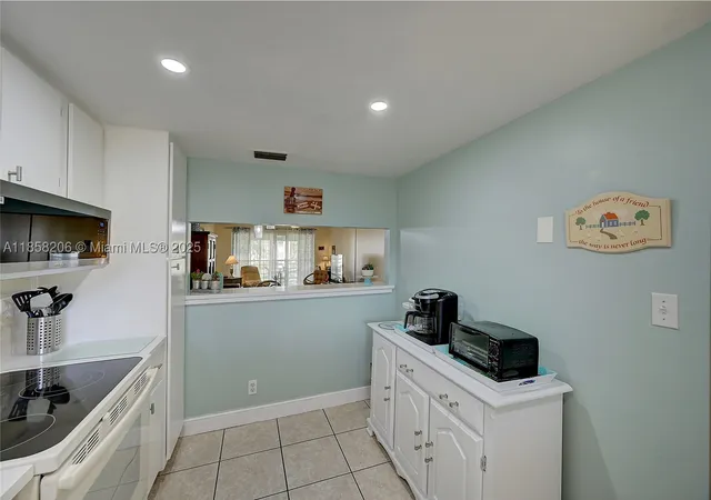 Photo 4 of Condo for sale at 3186 Via Poinciana #203, Lake Worth, FL 33467 | MLS# A11858206 | Listing updated on 2026-09-03