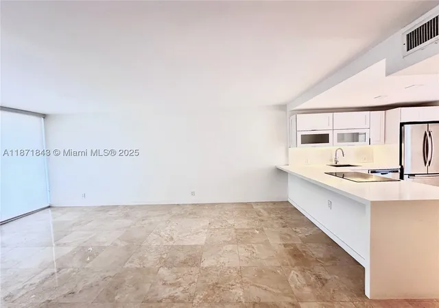 Photo 2 of Condo for sale at 3301 N Country Club Dr #410, Miami, FL 33180 | MLS# A11871843 | Listing updated on 2026-10-05