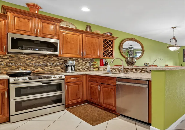 Photo 1 of Townhouse for sale at 3445 Nw 14th Ct, Fort Lauderdale, FL 33311 | MLS# A11862403 | Listing updated on 2026-09-02