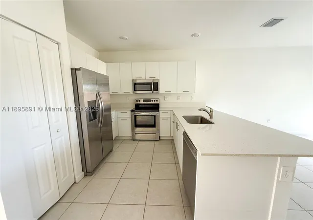 Photo 3 of Townhouse for sale at 12445 Nw 23rd Ct, Miami, FL 33167 | MLS# A11895891 | Listing updated on 2026-09-22