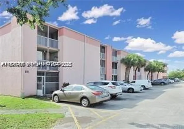 Listing Photo 1 - Condo for sale in building located at 19805 Sw 114Th Ave, Miami, FL 33157 - Unit #219