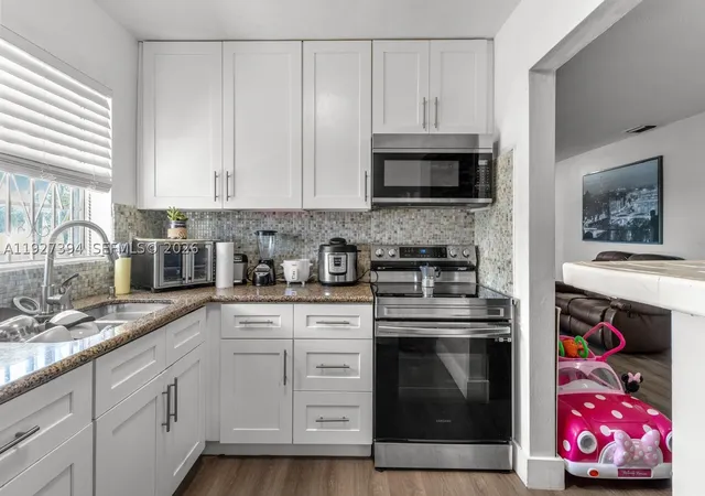 Photo 1 of Townhouse for sale at 11413 Sw 148th St, Miami, FL 33176 | MLS# A11927394 | Listing updated on 2026-09-11