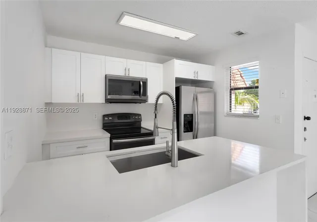 Photo 1 of Condo for sale at 6580 W 27th Ct #58-21, Hialeah, FL 33016 | MLS# A11928871 | Listing updated on 2026-09-04