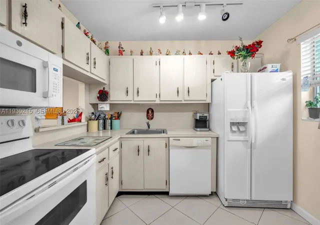 Photo 3 of Condo for sale at 3100 Holiday Springs Blvd #304, Margate, FL 33063 | MLS# A11930215 | Listing updated on 2026-09-08