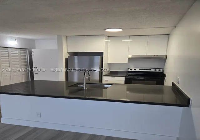 Photo 3 of Condo for sale at 2501 Riverside Dr #207-A, Coral Springs, FL 33065 | MLS# A11929103 | Listing updated on 2026-09-22