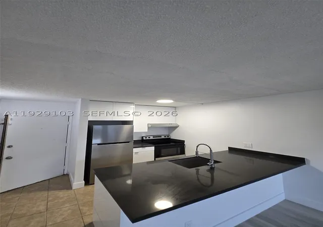 Photo 4 of Condo for sale at 2501 Riverside Dr #207-A, Coral Springs, FL 33065 | MLS# A11929103 | Listing updated on 2026-09-22