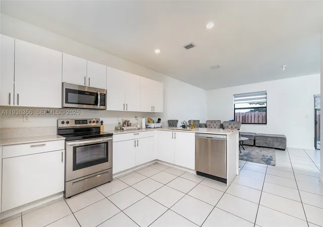 Photo 3 of Townhouse for sale at 23061 Sw 128Th Pl, Goulds, FL 33170 | MLS# A11936356 | Listing updated on 2026-08-27