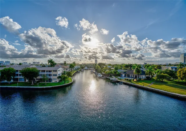 Listing Photo 1 - Condo for sale in building located at 437 Golden Isles Dr, Hallandale Beach, FL 33009 - Unit #4D